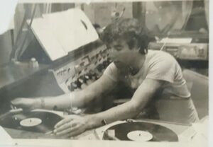 Ray cueing up a record at WSBU-FM St. Bonaventure in 1982. 